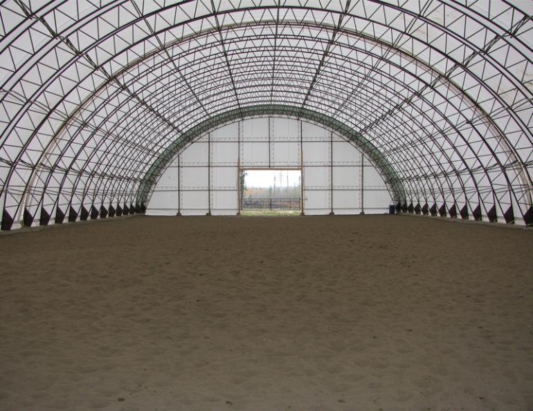 horse riding arena, indoor horse riding arenas, building horse riding arena, we cover, dutchmasters, ironwood building systems, fabric covered horse riding arena, wood post frame horse riding arena, lindsay day remt, steel frame horse riding arena, pre-engineered horse riding arenas, pre-built horse riding arenas, horse arena footing, pdi lasergrade, horse riding arena permit